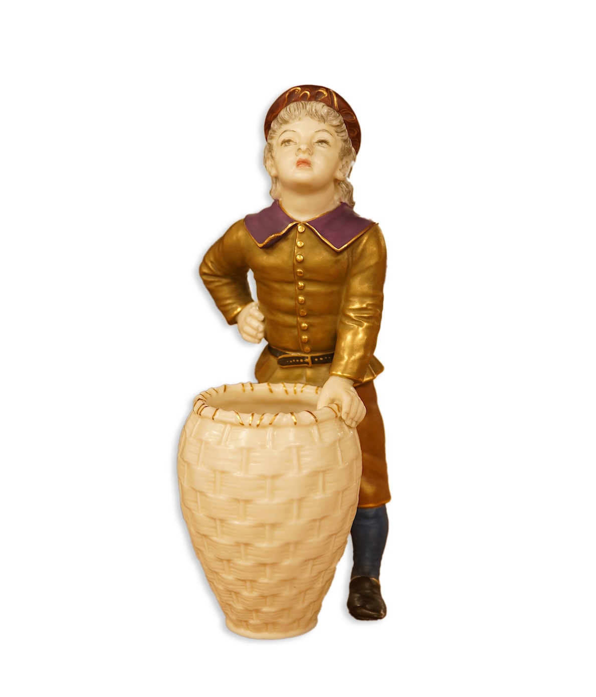 A late 19th century Royal Worcester figure of a boy with basket, 17.5cm high